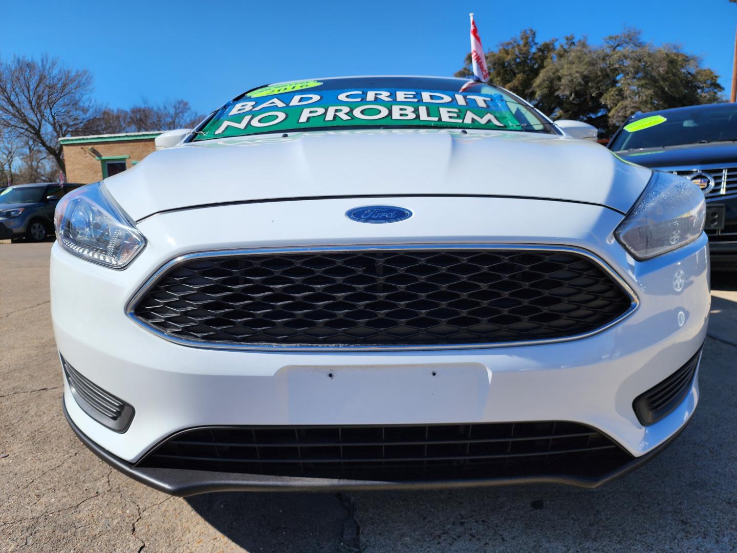 2016 WHITE Ford Focus SE (1FADP3F24GL) with an 2.0L L4 DOHC 16V engine, AUTO transmission, located at 2660 S.Garland Avenue, Garland, TX, 75041, (469) 298-3118, 32.885551, -96.655602 - Welcome to DallasAutos4Less, one of the Premier BUY HERE PAY HERE Dealers in the North Dallas Area. We specialize in financing to people with NO CREDIT or BAD CREDIT. We need proof of income, proof of residence, and a ID. Come buy your new car from us today!! This is a Super Clean 2016 FORD FOCUS - Photo#9